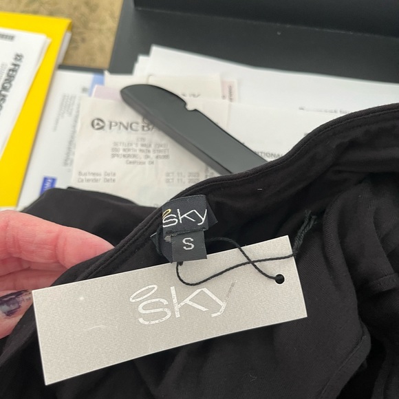 Sky dress available in 3 sizes. Decorative neckline. 93% Rayon & 7% Spandex. - Picture 7 of 7